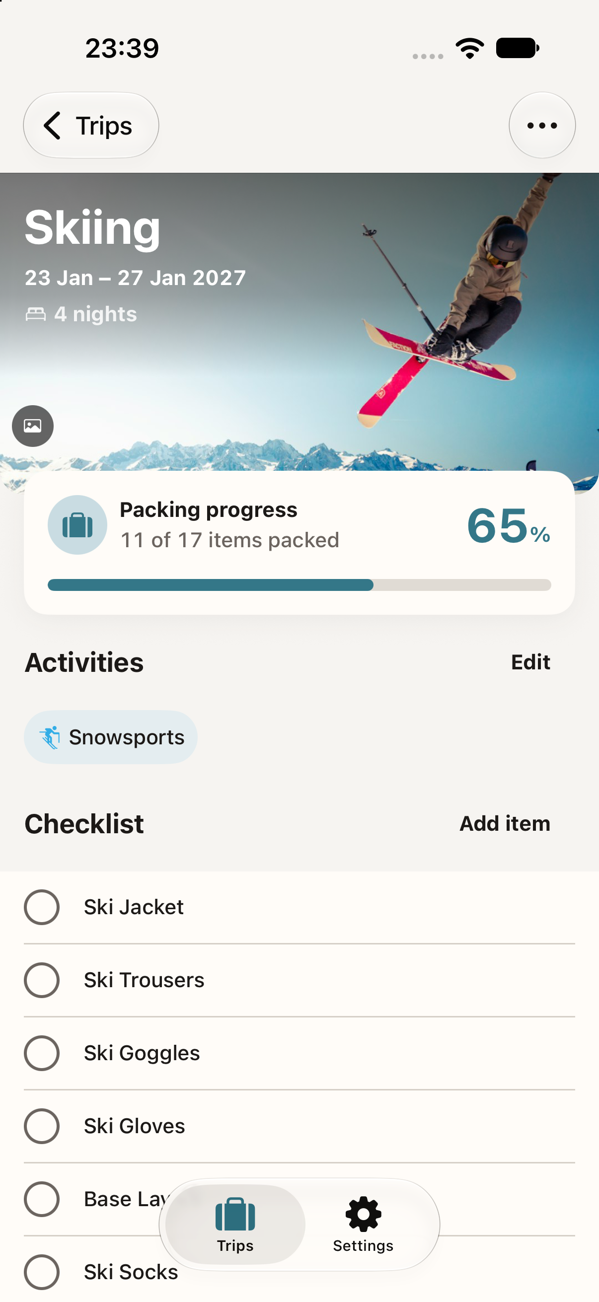 A ski trip checklist in Packlet showing 11 of 17 items packed